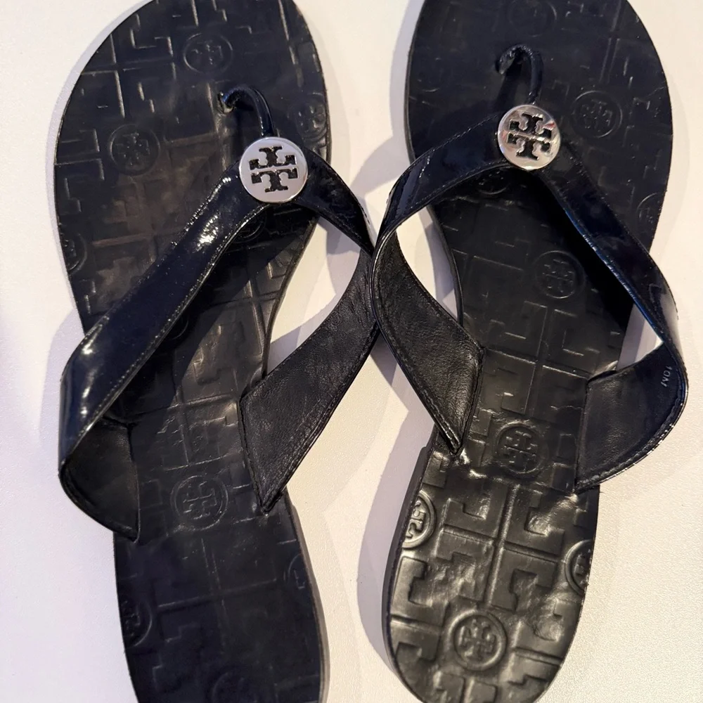 Tory Burch Black Flip Flops with Silver Logo - Picture 2 of 3
